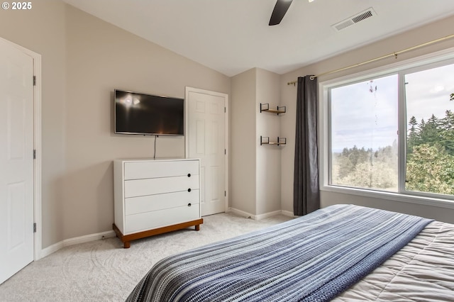 10372 NW Forestview Way, Portland, OR 97229 - bedroom with light carpet, lofted ceiling, baseboards, and a ceiling fan