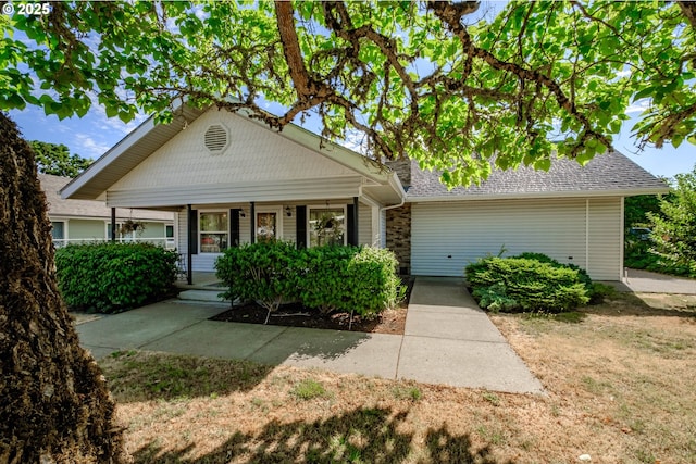 view of front of home with covered porch and a front lawn