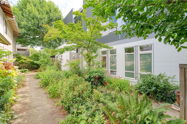 2021 SE Clinton St Unit 103, Portland, OR 97202 - view of side of home with stucco siding