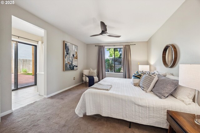 carpeted bedroom with access to exterior, baseboards, and a ceiling fan