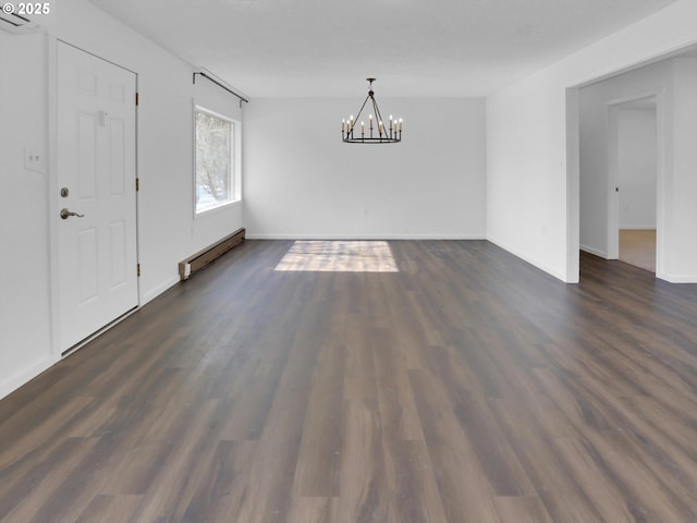 unfurnished dining area with a chandelier, a baseboard radiator, dark wood finished floors, and baseboards