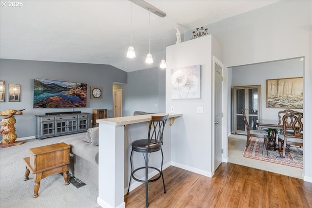 21600 NE Forest Dr, Yamhill, OR 97148 - living room featuring wood finished floors, baseboards, and vaulted ceiling