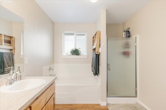 21600 NE Forest Dr, Yamhill, OR 97148 - bathroom with a stall shower, a bath, wood finished floors, and vanity
