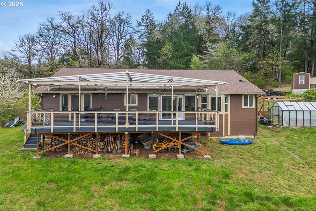 21600 NE Forest Dr, Yamhill, OR 97148 - back of property featuring an exterior structure, an outbuilding, a yard, and a deck