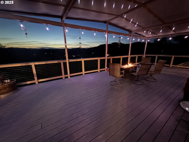 21600 NE Forest Dr, Yamhill, OR 97148 - deck at dusk with an outdoor fire pit