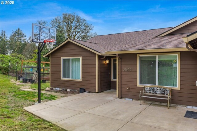 21600 NE Forest Dr, Yamhill, OR 97148 - single story home with a garage, a shingled roof, and gravel driveway