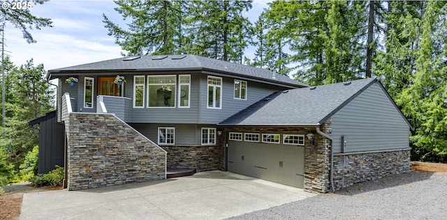 32518 Dillard Rd, Eugene, OR 97405 - view of front of home with stone siding, driveway, a garage, and stairs