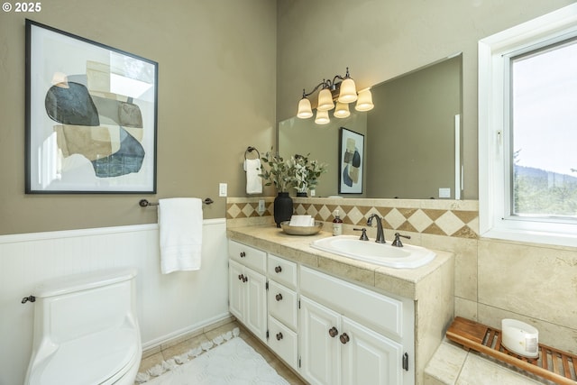 32518 Dillard Rd, Eugene, OR 97405 - bathroom featuring vanity, wainscoting, and tile patterned floors