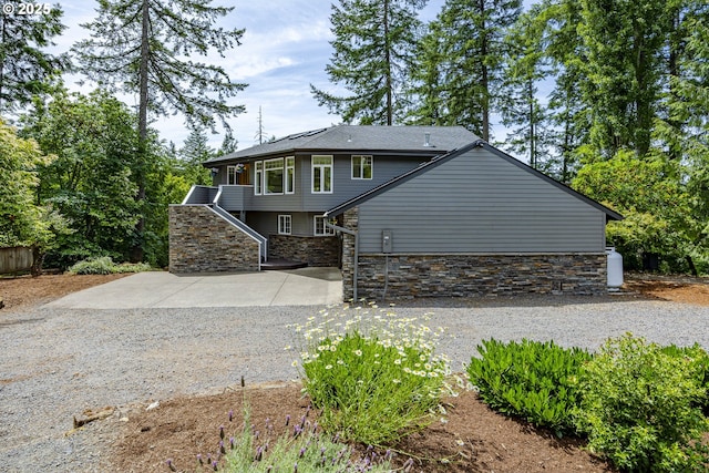 32518 Dillard Rd, Eugene, OR 97405 - view of front of property with stone siding and stairs