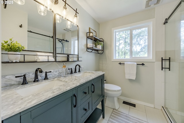32518 Dillard Rd, Eugene, OR 97405 - full bath featuring baseboard heating, a shower stall, double vanity, and tile patterned floors