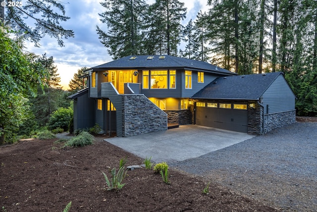 32518 Dillard Rd, Eugene, OR 97405 - view of front of home with driveway, stone siding, and a garage