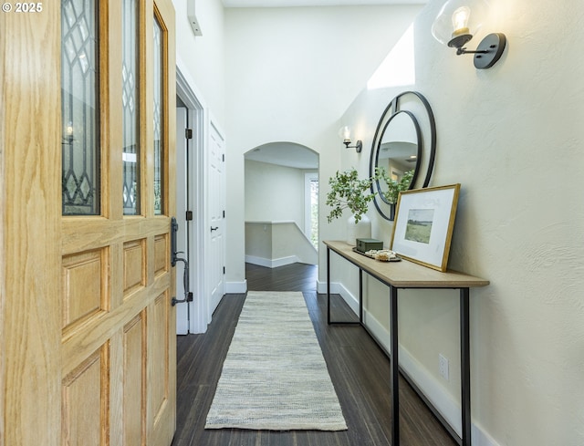 32518 Dillard Rd, Eugene, OR 97405 - entrance foyer featuring arched walkways and dark wood-type flooring
