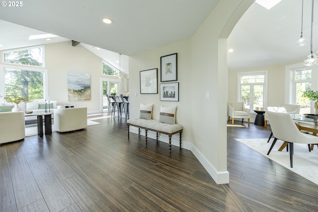 32518 Dillard Rd, Eugene, OR 97405 - hallway with arched walkways, wood finished floors, and recessed lighting