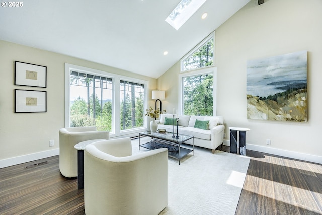 32518 Dillard Rd, Eugene, OR 97405 - living area featuring a skylight, high vaulted ceiling, wood finished floors, and recessed lighting