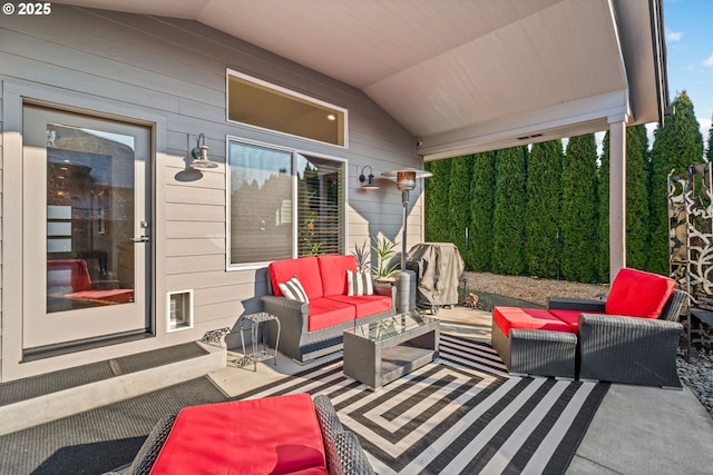 view of patio with area for grilling and an outdoor hangout area