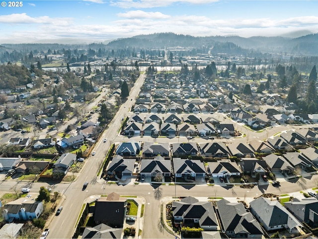 drone / aerial view featuring a mountain view