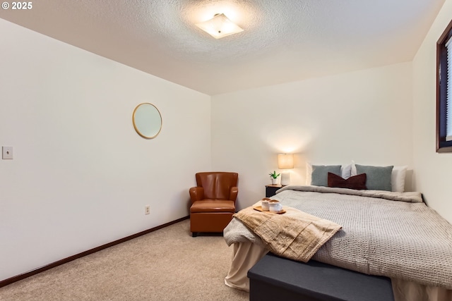 bedroom featuring light carpet and baseboards