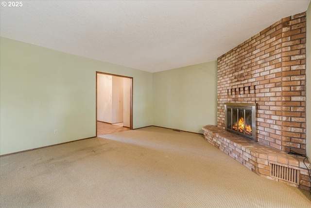 324 N Peacock Ct, Newberg, OR 97132 - unfurnished living room with a fireplace and carpet floors