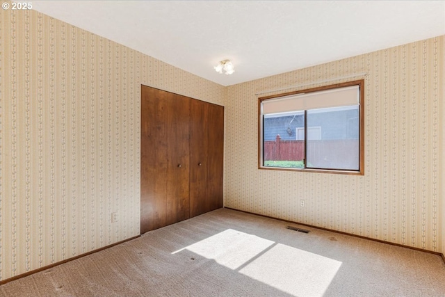 324 N Peacock Ct, Newberg, OR 97132 - unfurnished bedroom featuring a closet and carpet