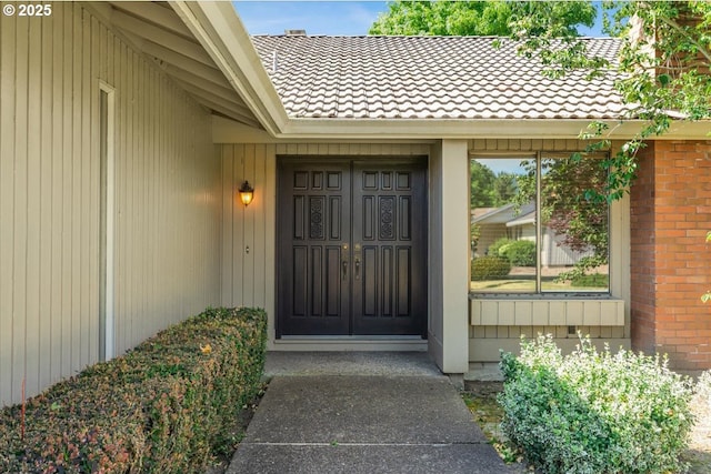 324 N Peacock Ct, Newberg, OR 97132 - doorway to property with brick siding and a tiled roof
