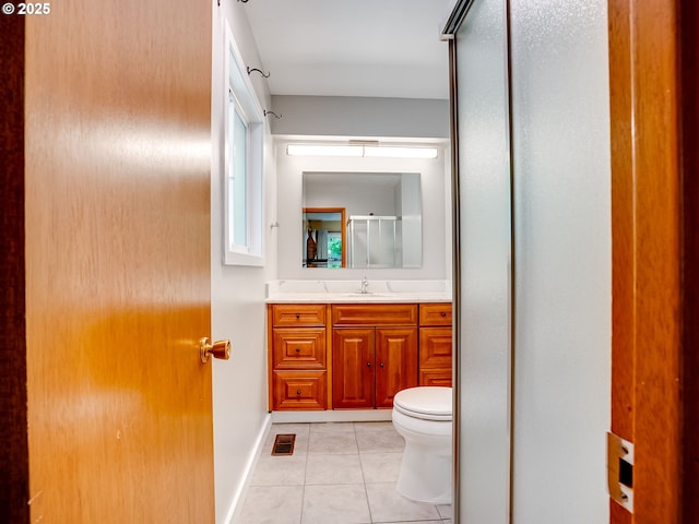 5210 N Emerson Dr, Portland, OR 97217 - bathroom featuring a shower stall, vanity, and tile patterned floors