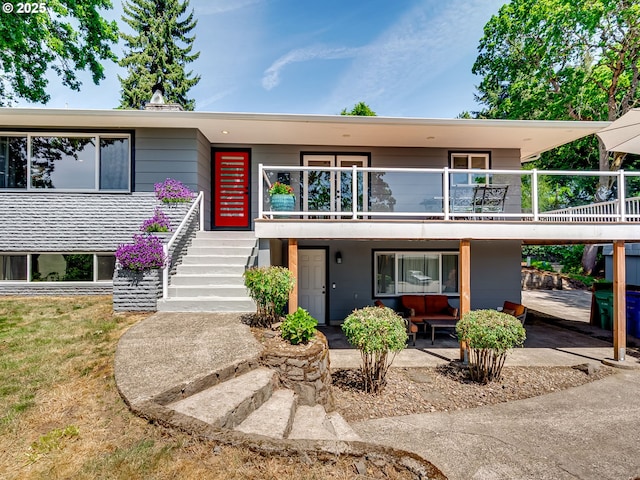 5210 N Emerson Dr, Portland, OR 97217 - view of front of house featuring stairs and a balcony