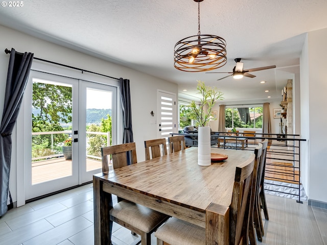 5210 N Emerson Dr, Portland, OR 97217 - dining area featuring french doors, plenty of natural light, a ceiling fan, recessed lighting, and a textured ceiling