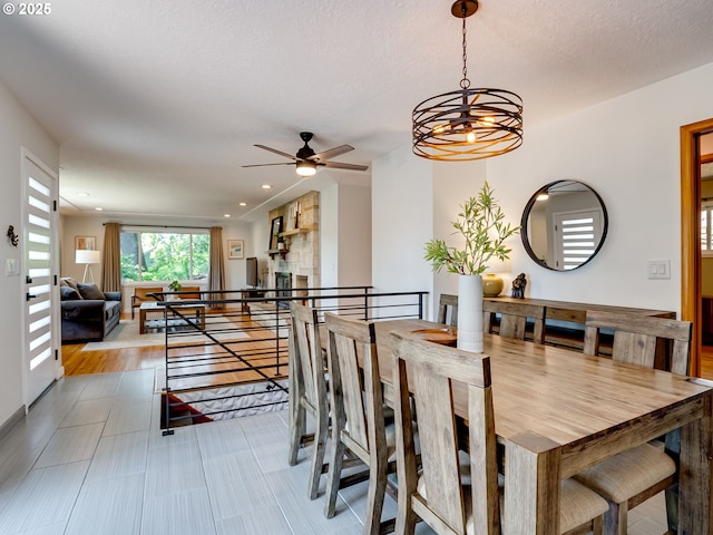 5210 N Emerson Dr, Portland, OR 97217 - dining area with a ceiling fan, recessed lighting, and a chandelier