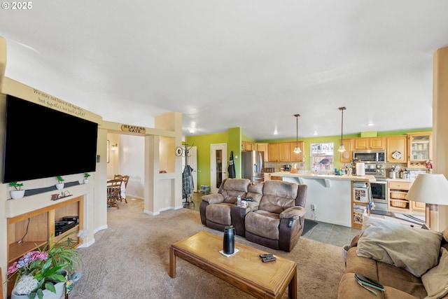 living room featuring light carpet