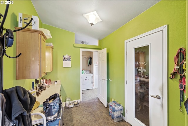 bathroom featuring washer / dryer