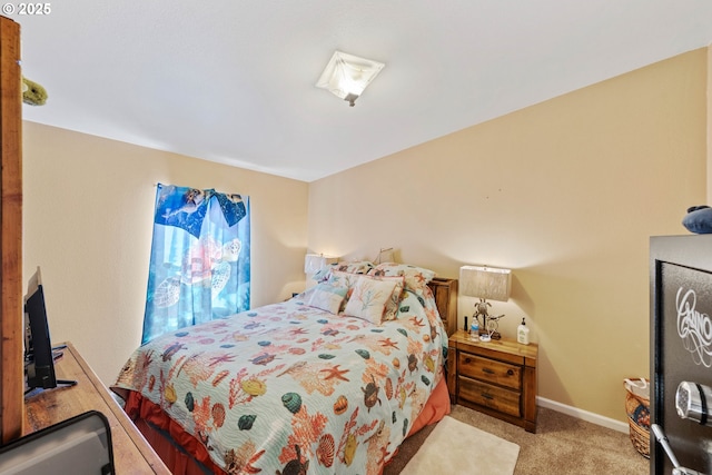 bedroom with light colored carpet