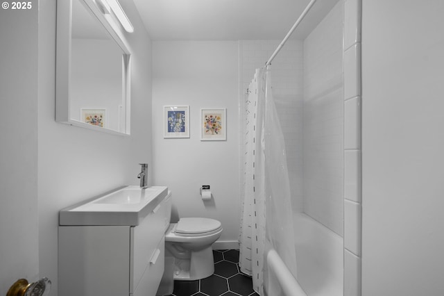 bathroom with tile patterned flooring, shower / tub combo with curtain, toilet, and vanity