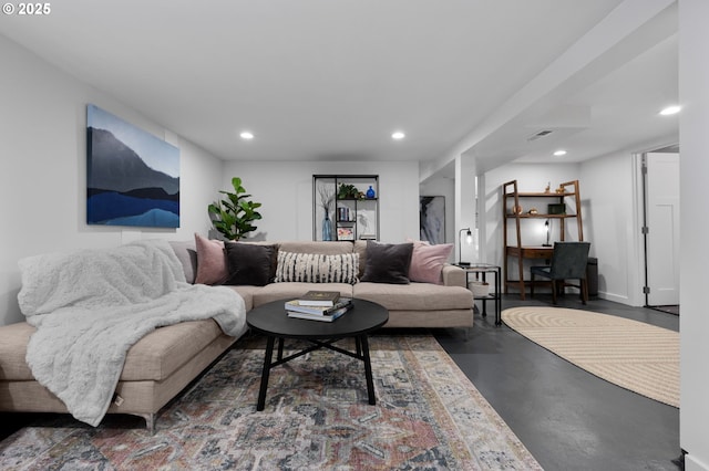 living room with recessed lighting, visible vents, and finished concrete flooring