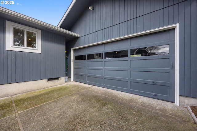 garage featuring driveway