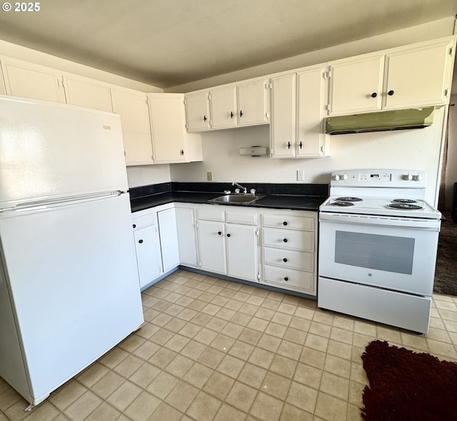 2440 Pine St, Seaside, OR 97138 - kitchen featuring white appliances, under cabinet range hood, a sink, dark countertops, and light tile patterned flooring