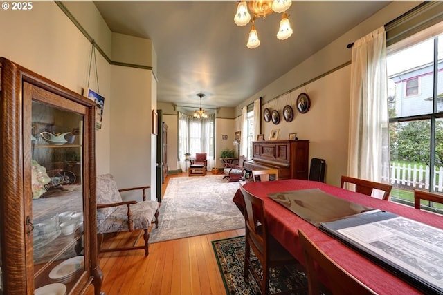 369 37th St, Astoria, OR 97103 - hallway with light wood finished floors, arched walkways, vaulted ceiling, and a desk