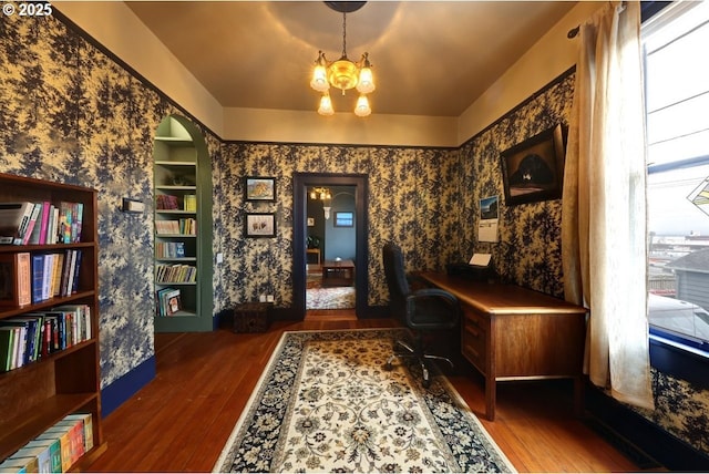 369 37th St, Astoria, OR 97103 - bedroom featuring a chandelier