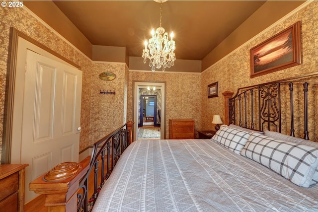 369 37th St, Astoria, OR 97103 - stairway featuring wallpapered walls, wood-type flooring, and ornamental molding