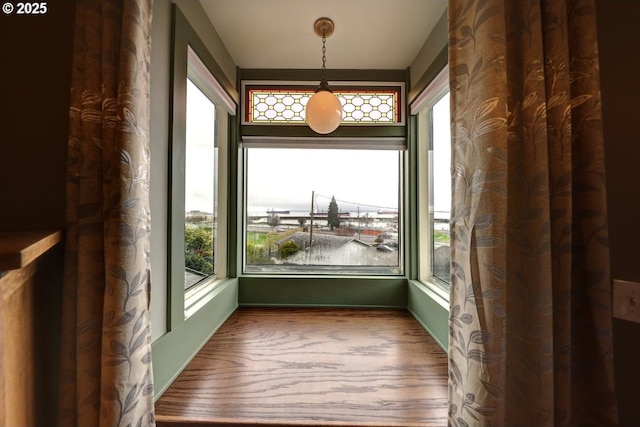 369 37th St, Astoria, OR 97103 - hallway with wood finished floors and a wainscoted wall