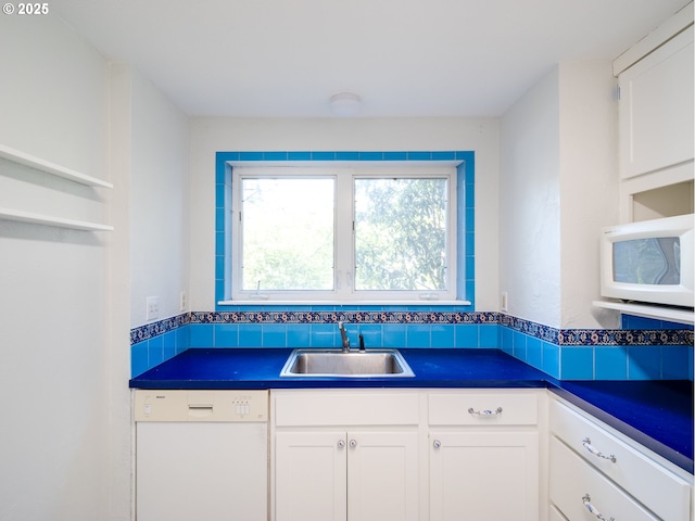 4345 SW 94th Ave, Portland, OR 97225 - kitchen featuring white appliances, open shelves, white cabinets, dark countertops, and a sink