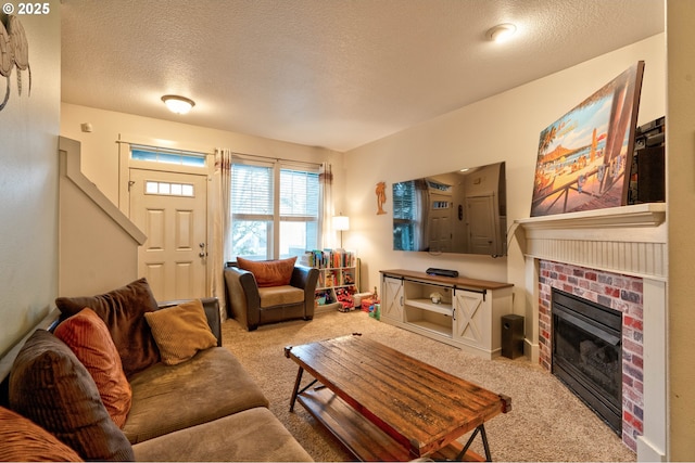 carpeted living room with a textured ceiling and a fireplace