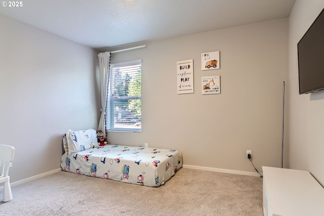 7897 SW Mara Ct, Portland, OR 97224 - carpeted bedroom featuring baseboards