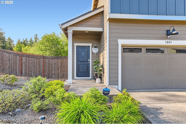 7897 SW Mara Ct, Portland, OR 97224 - entrance to property featuring board and batten siding