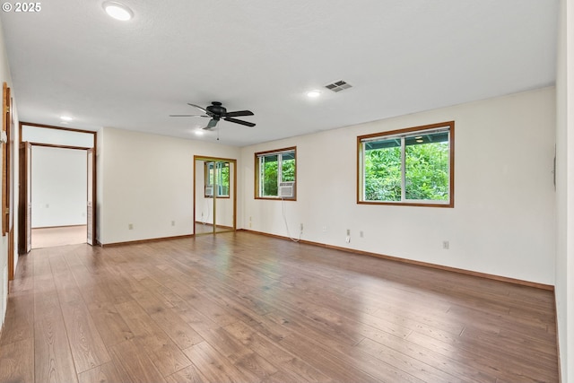 380 W Arlington St, Gladstone, OR 97027 - spare room featuring ceiling fan, hardwood / wood-style flooring, cooling unit, and recessed lighting