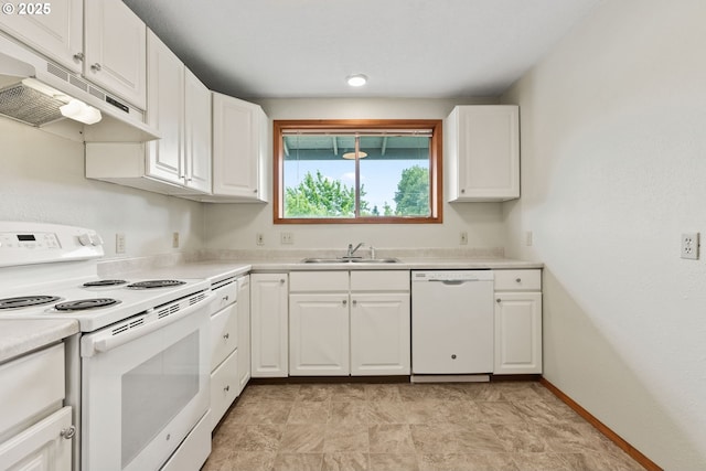 380 W Arlington St, Gladstone, OR 97027 - kitchen with white appliances, under cabinet range hood, white cabinets, and light countertops