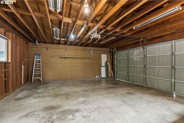 380 W Arlington St, Gladstone, OR 97027 - garage featuring a garage door opener