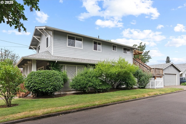 380 W Arlington St, Gladstone, OR 97027 - view of front of home featuring a front lawn and a garage