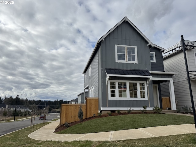 view of front of property with a front lawn