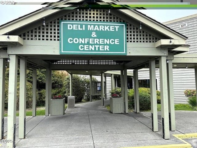 88416 1st Ave Unit 402, Florence, OR 97439 - view of car parking with a carport and driveway