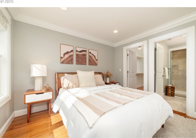 621 NE Randall Ave, Portland, OR 97232 - bedroom with crown molding, baseboards, recessed lighting, a walk in closet, and light wood finished floors